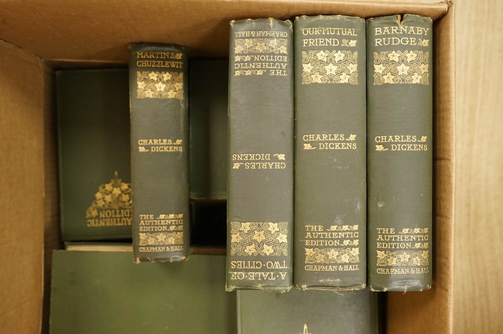 A collection of clothbound volumes of the authentic edition of the works of Charles Dickens published by Chapman and Hall, published 1901